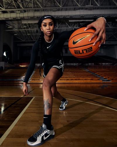 Woman basketball player in Nike Sabrina Sneakers
