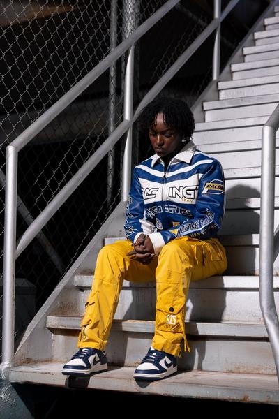 Woman in Nike Dunks and Leather Jacket