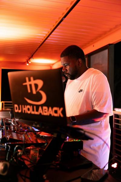 DJ Hollaback spinning during his set