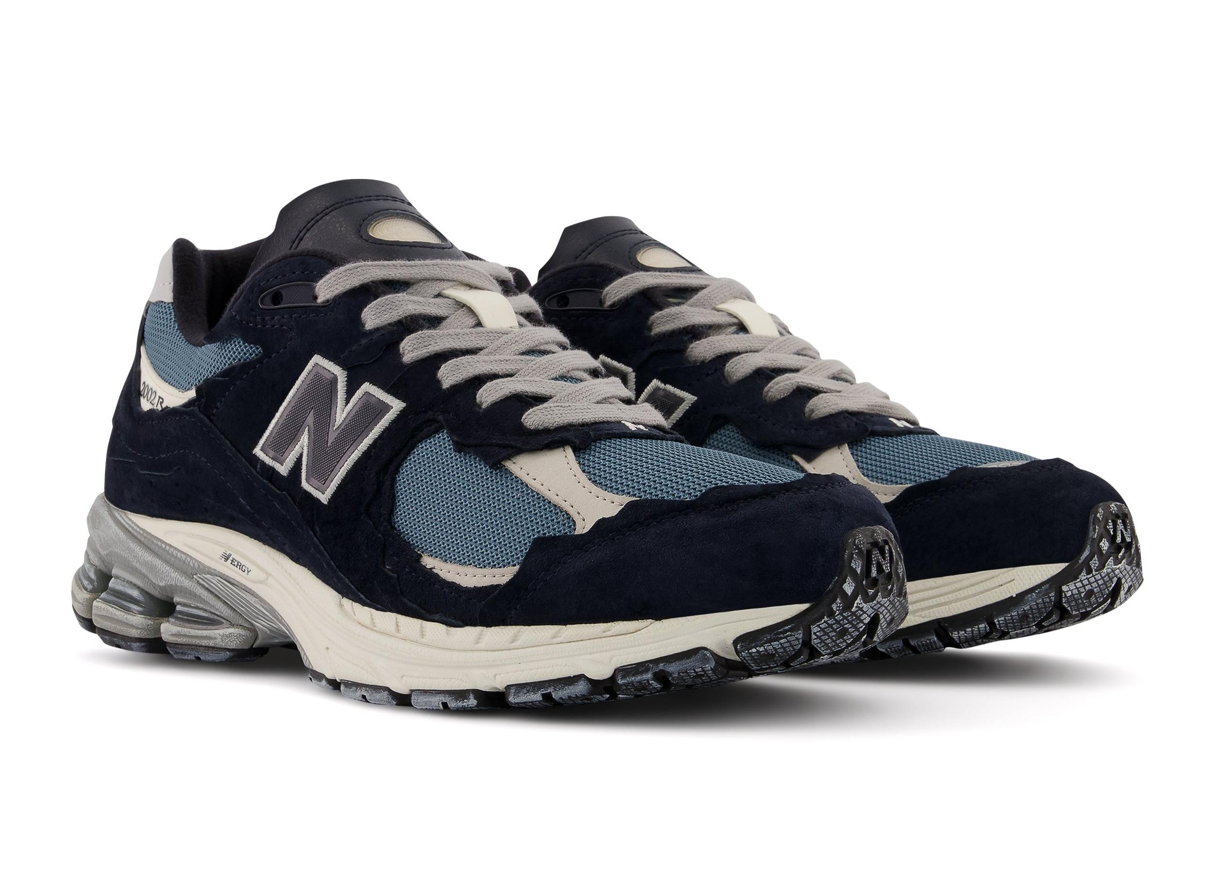 New Balance 2002R blue side by side