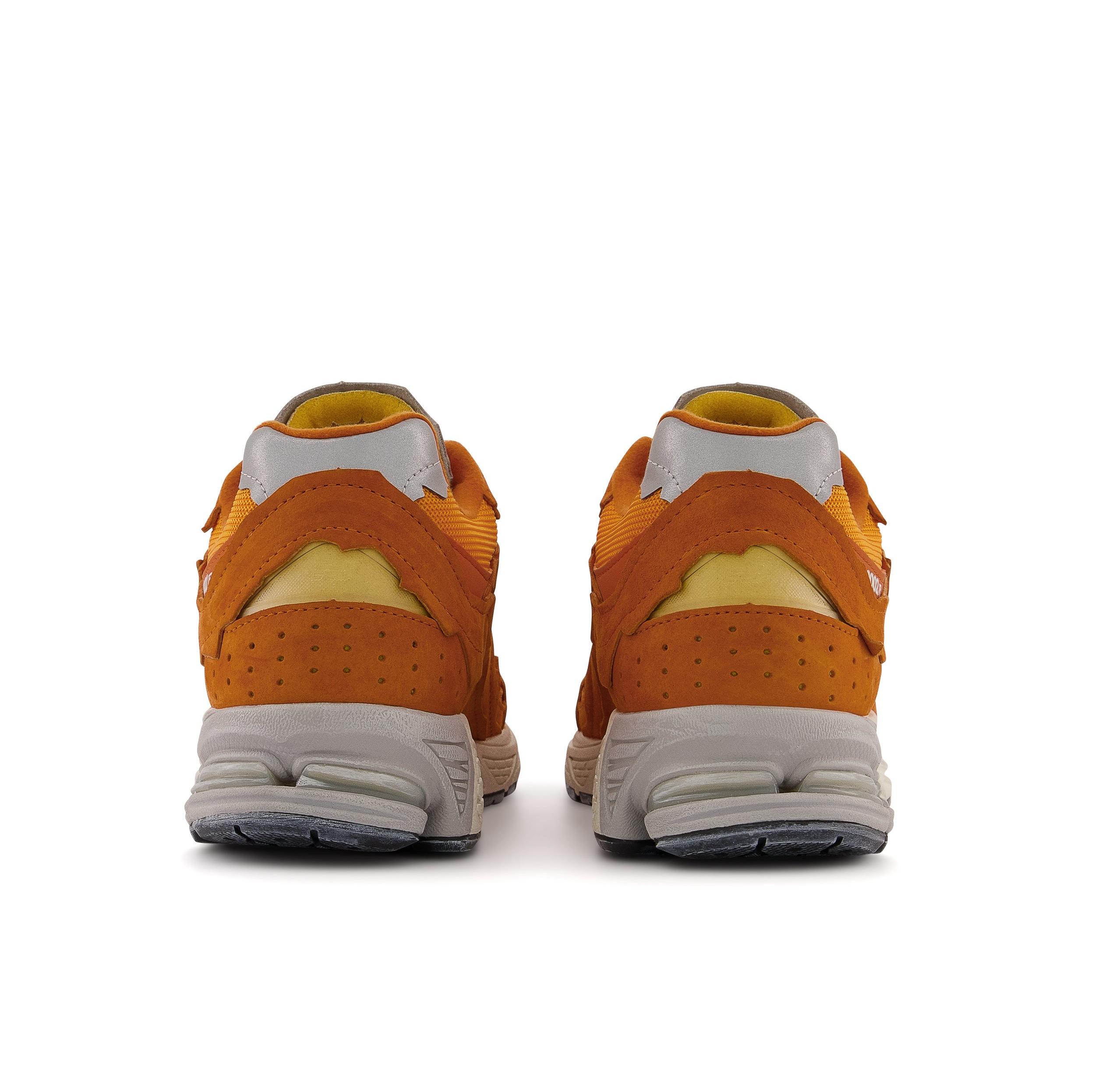 New Balance 2002R orange heels