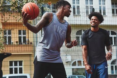 Move It, Move It - Man in his 20's play basketball on outdoor court