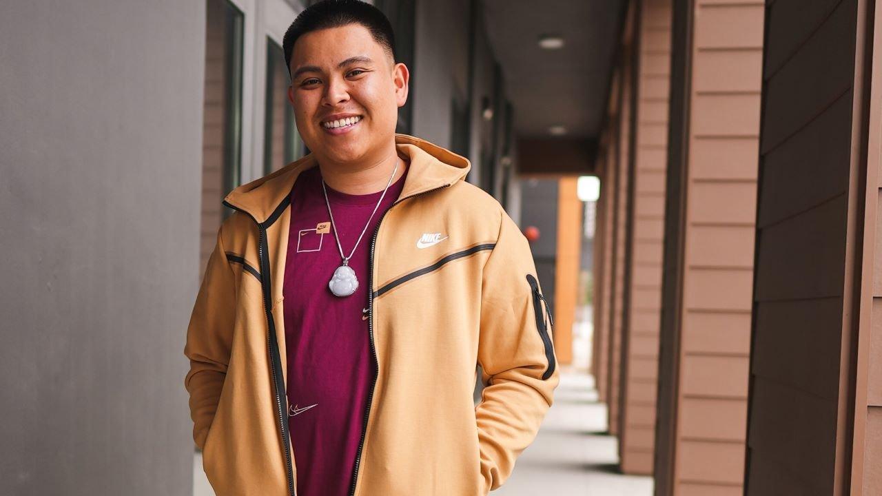 Alex Walter posing in Nike Tech Fleece and Tee