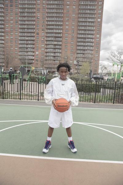 Woman in Puma x Fenty Sneakers