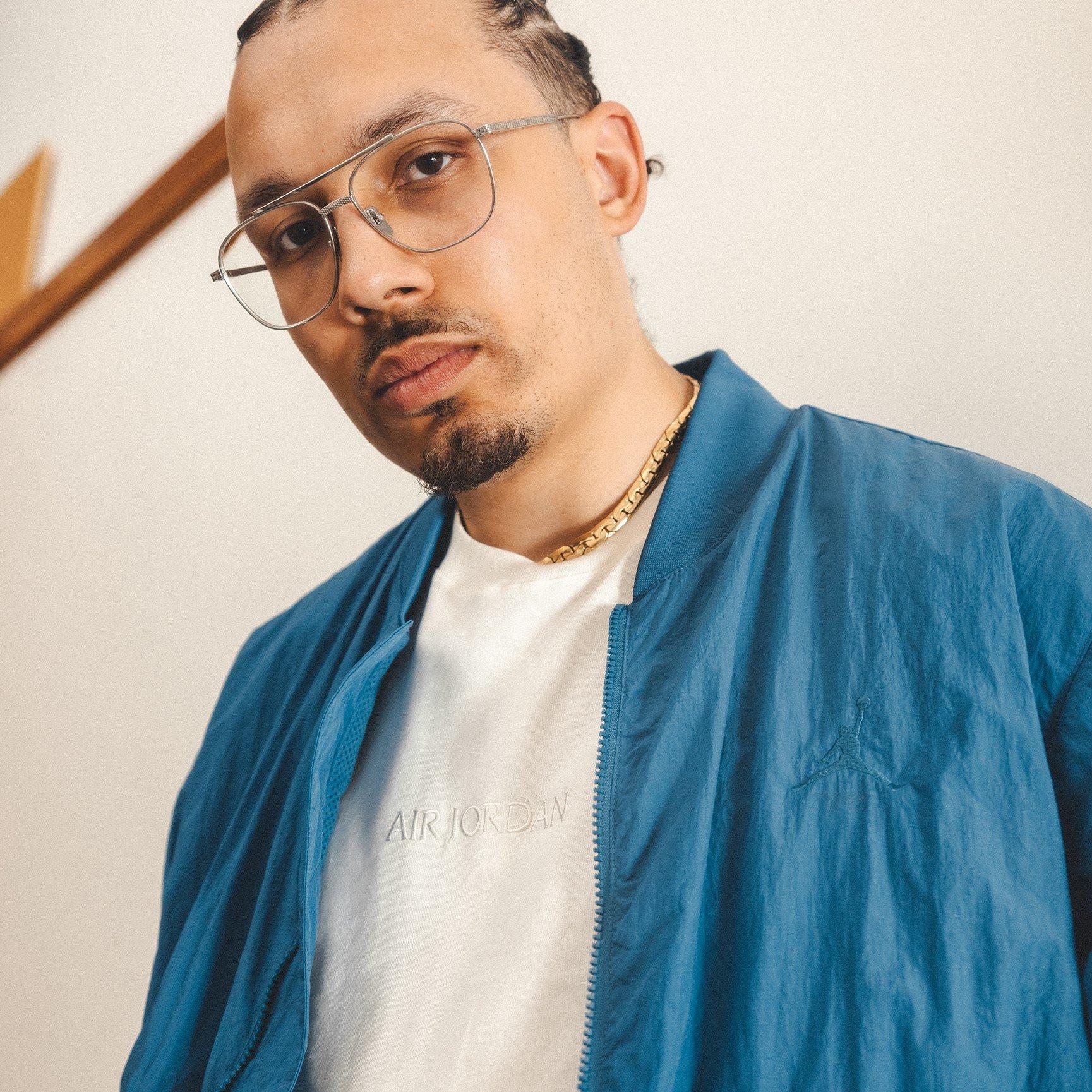 DJ-Sneakerhead-Wearing-Blue-Jordan-Jacket-1