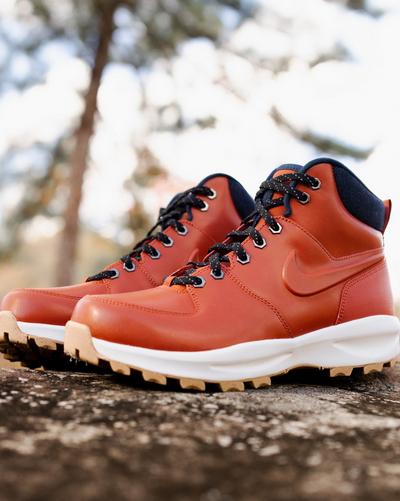 Nike boots on a tree