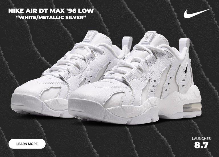 Nike Air DT Max ’96 Low in White/Metallic Silver displayed side by side on a dark textured background.