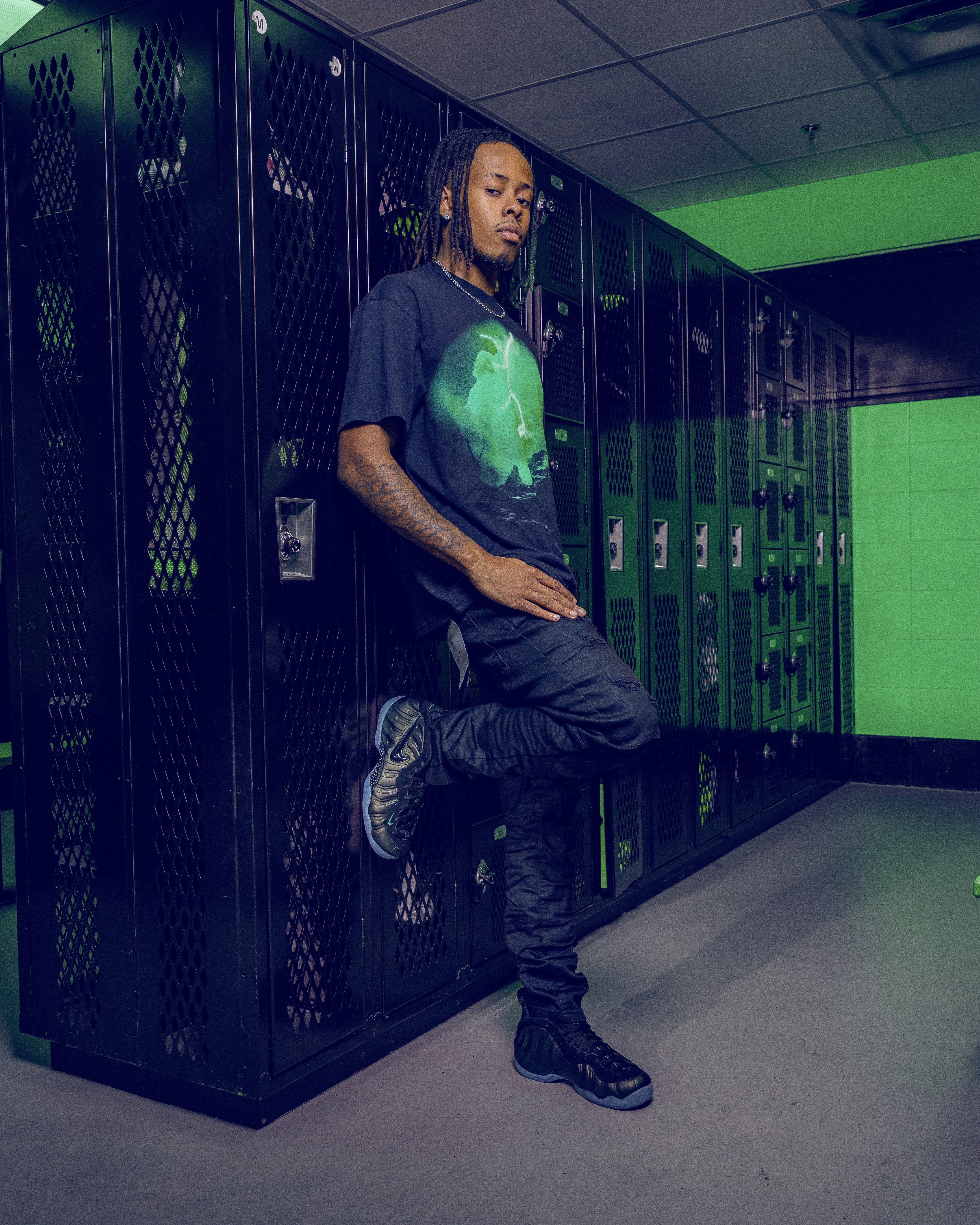 Young man in Nike Air Foamposite Pro "Pine Green" 