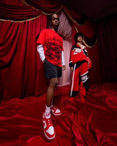 Young man and woman in Nike apparel and sneakers