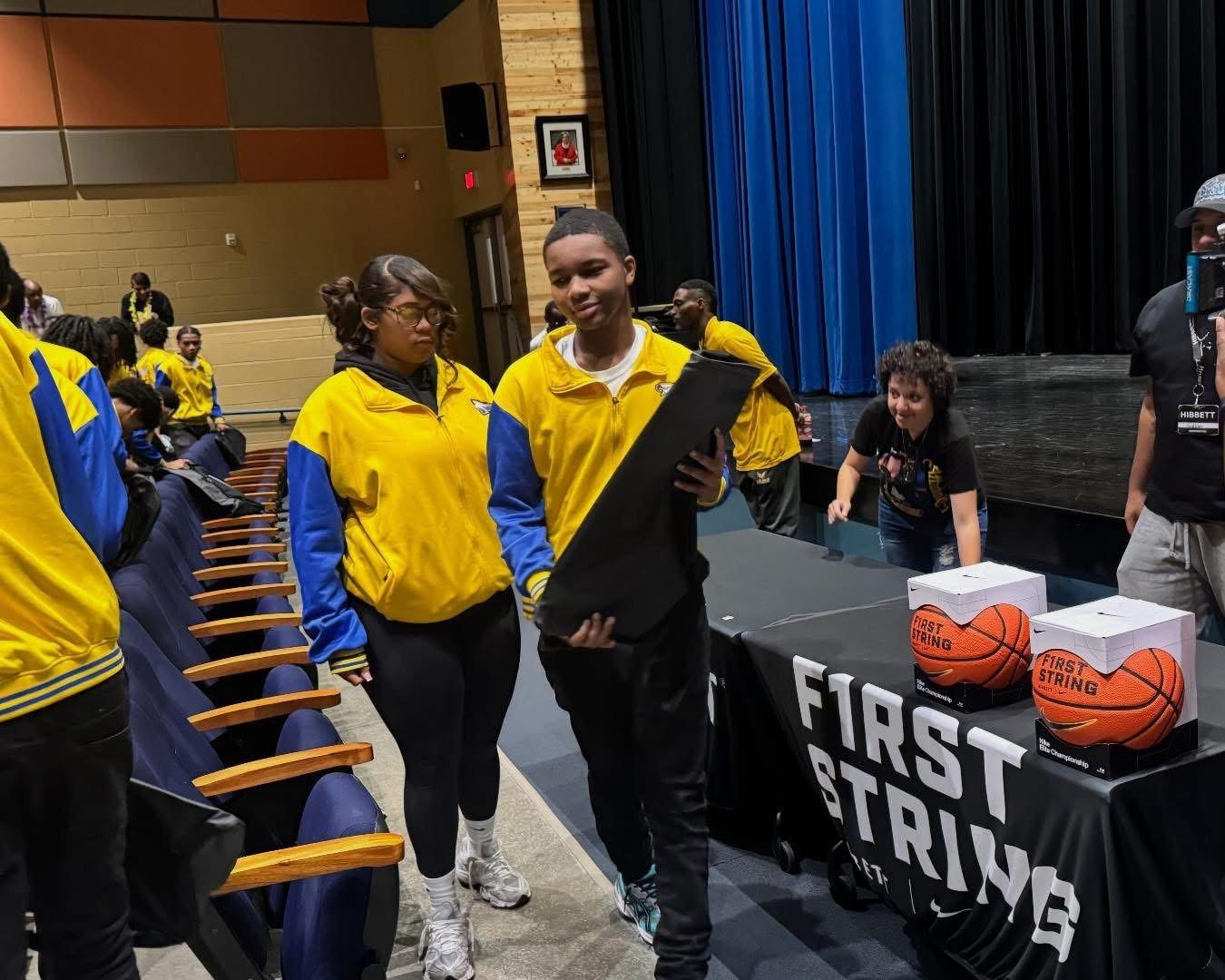 Young boy and girl walking thru rows