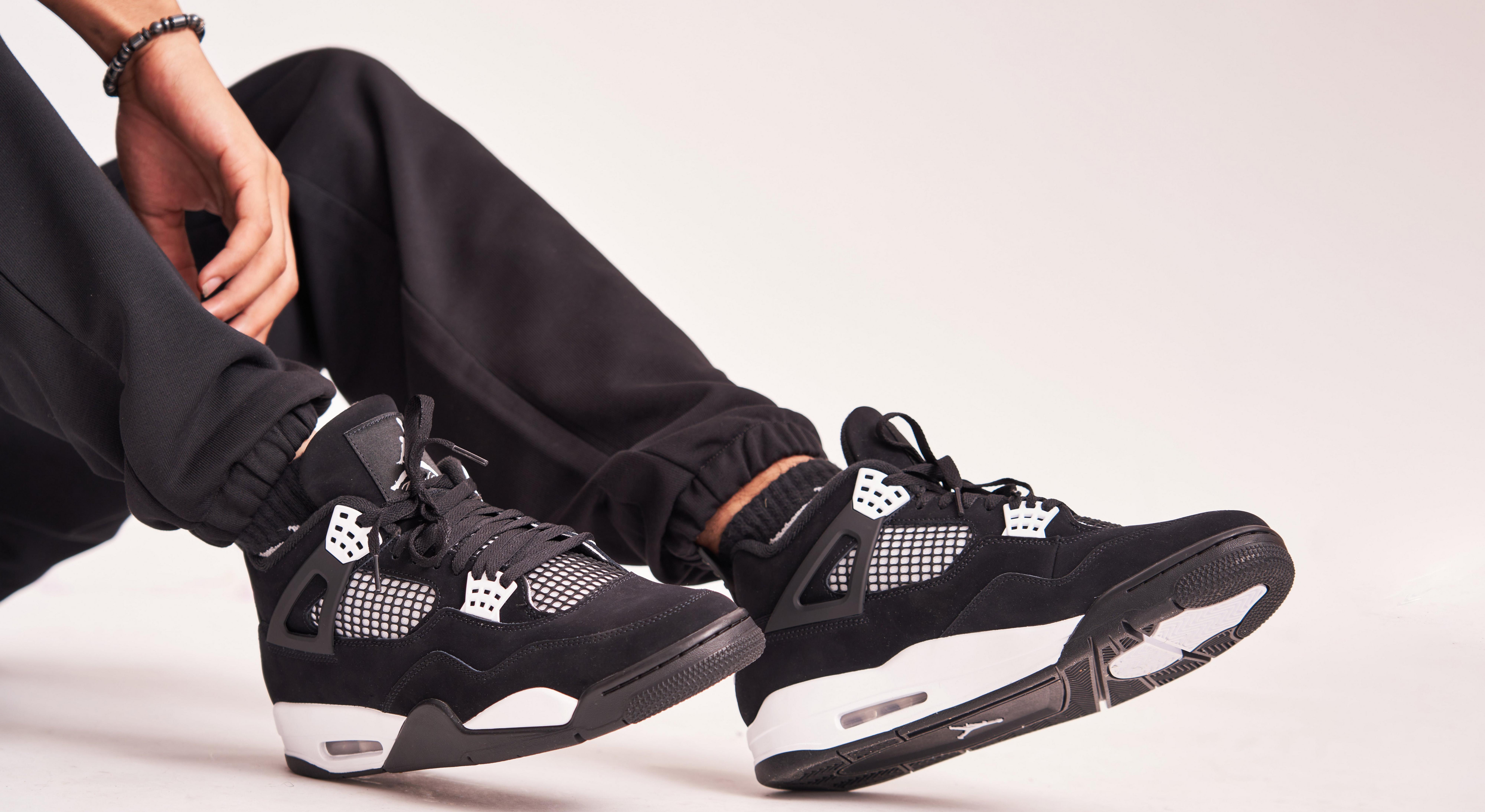 Jordan retro 4 black white hotsell