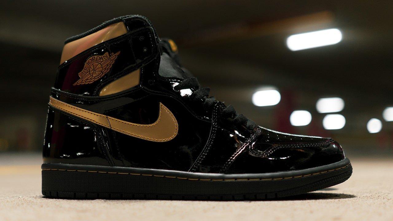 black and gold high top jordans