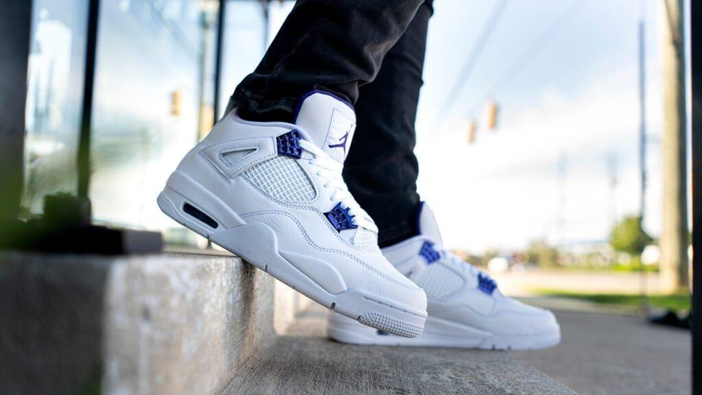 all white and purple jordan 4