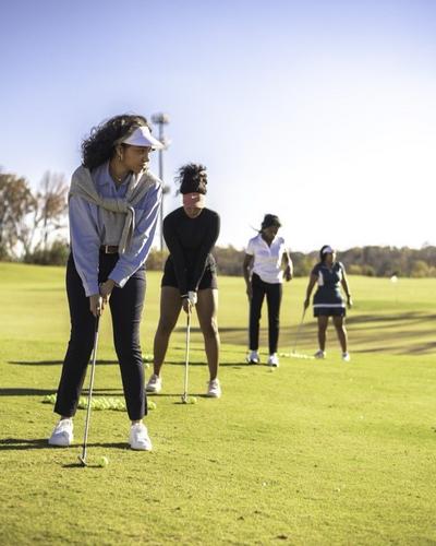 Women golfing
