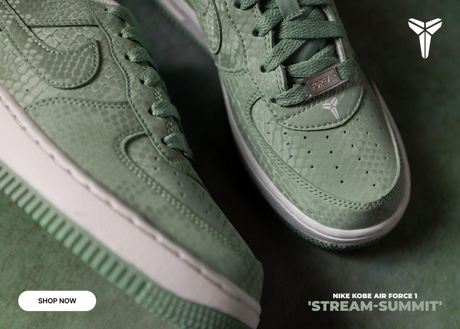 Nike Kobe Air Force 1 Stream-Summit sneakers in light green snakeskin texture with white midsoles on a green background. Features the Kobe Bryant logo in the corner and on the heel, text reading Nike Kobe Air Force 1 Stream-Summit, and a Shop Now button.