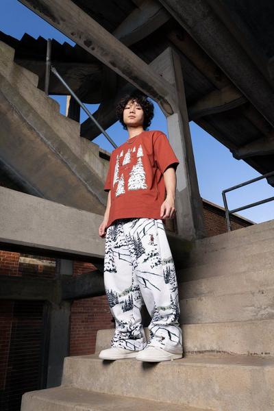 Women in apparel and Nike Court Vision sneakers