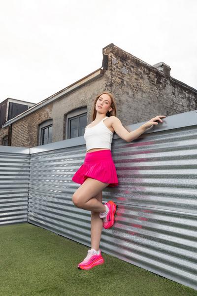 Woman modeling Nike Vomero Plus