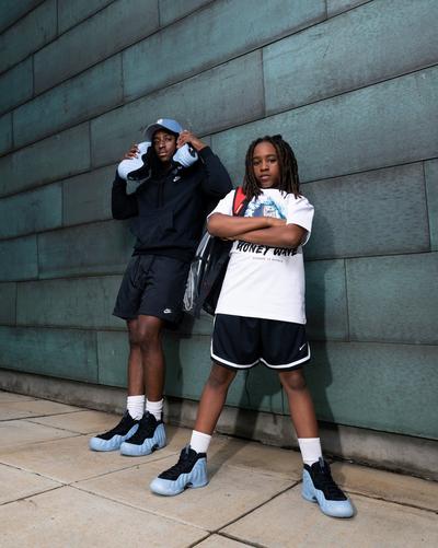 Young man and boy in Psychic Blue Nike Foamposites