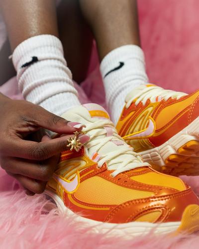 Young woman in Nike Air Max Moto 2K