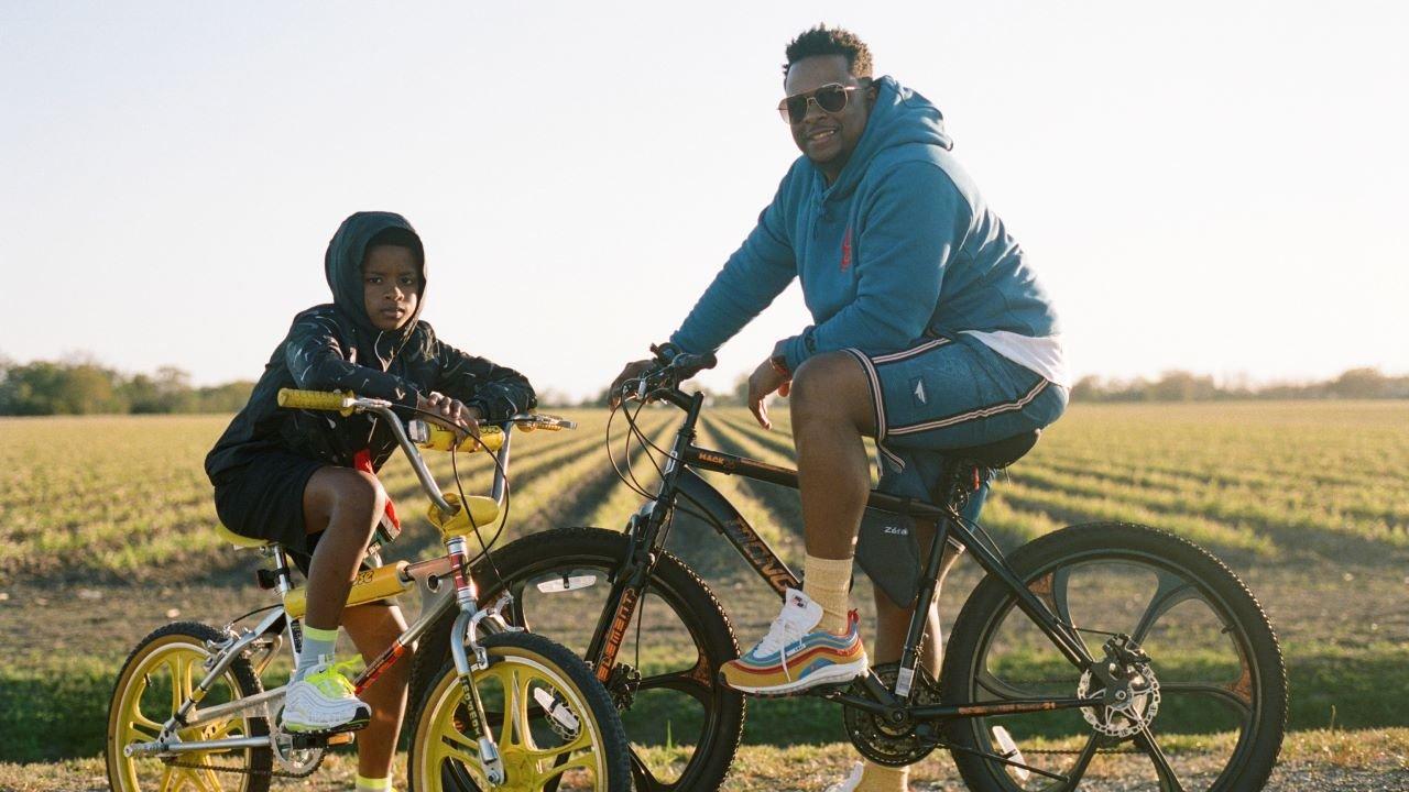 Lifestyle shot of STSH Reggie Ward and son