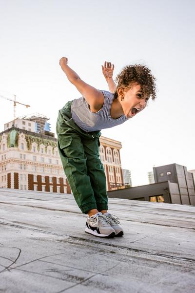 Girl in Saucony sneakers
