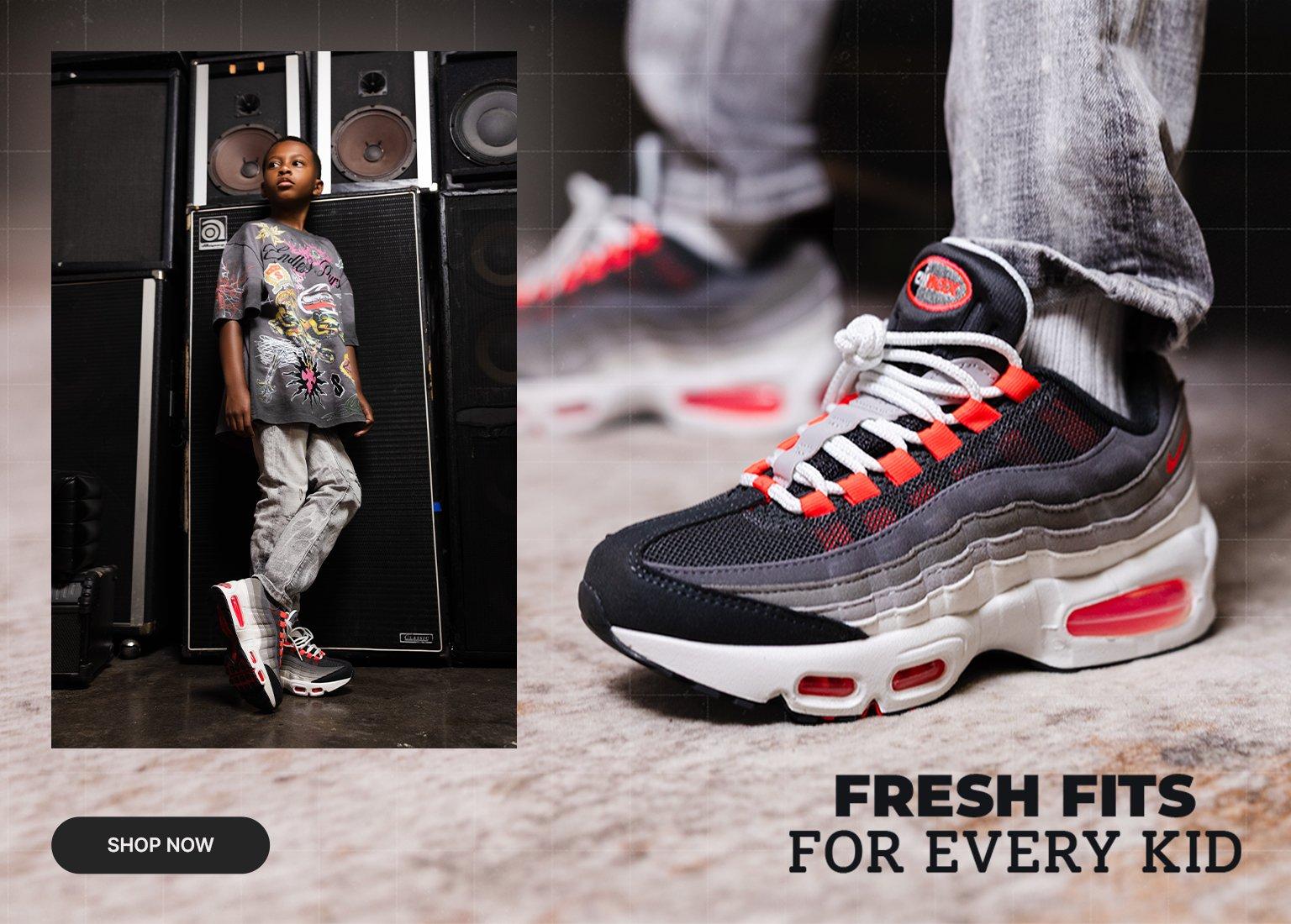 Kids' graphic tee and denim outfit with Nike Air Max 95 sneakers.