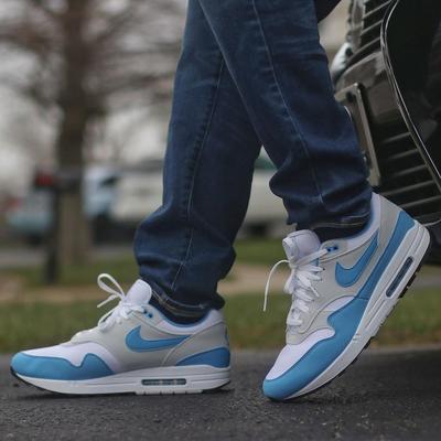 White Jordan Shirt and black bucket hat