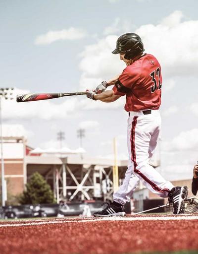 Selecting Gloves by Playing Position - Baseball Player Swinging Bat