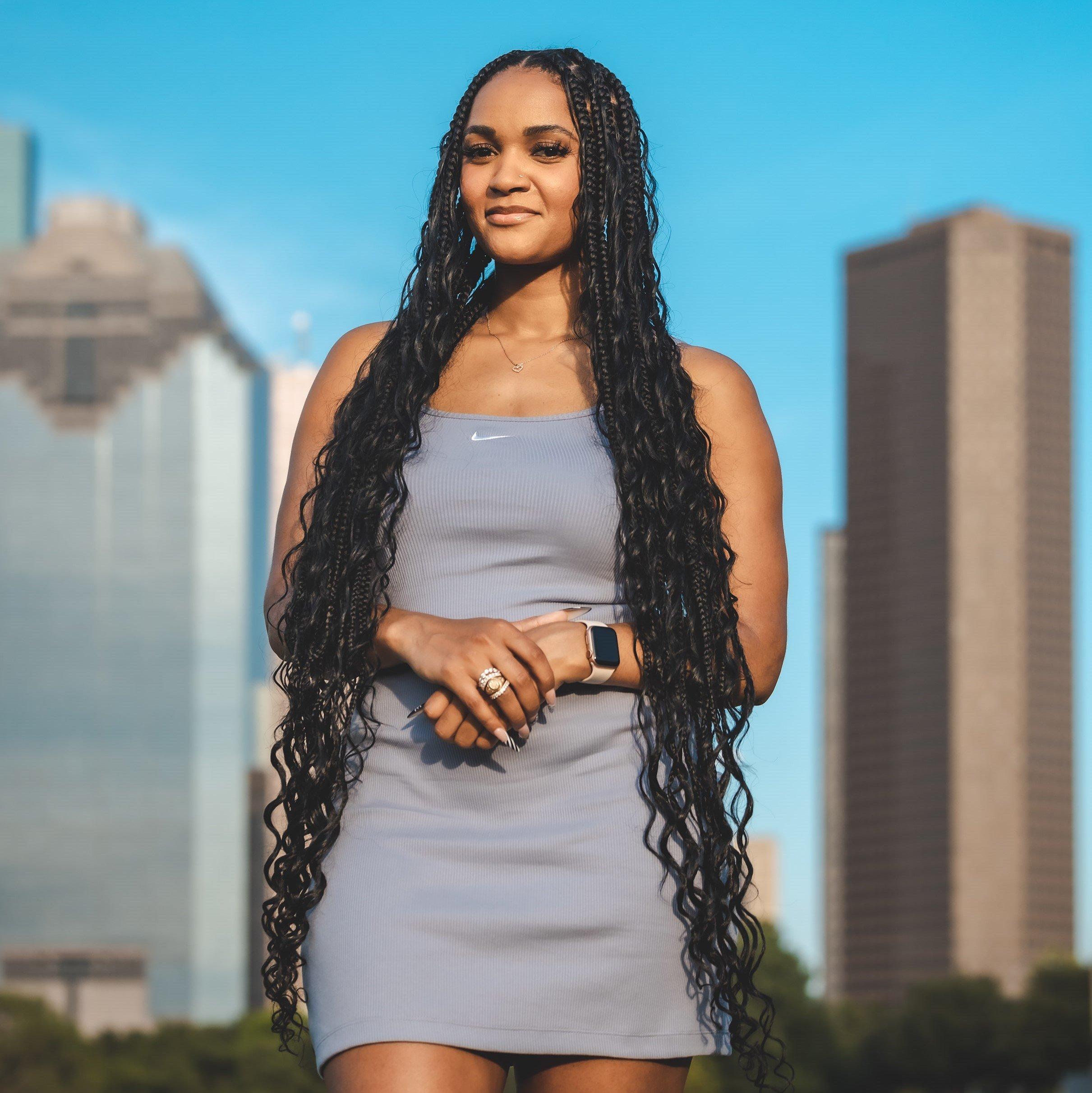 Sydney Carter against Dallas, TX Skyline