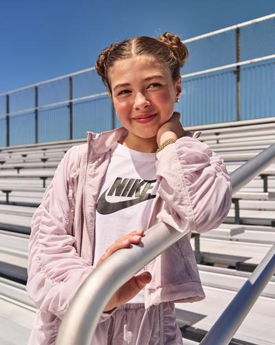 Girl modeling Nike apparel