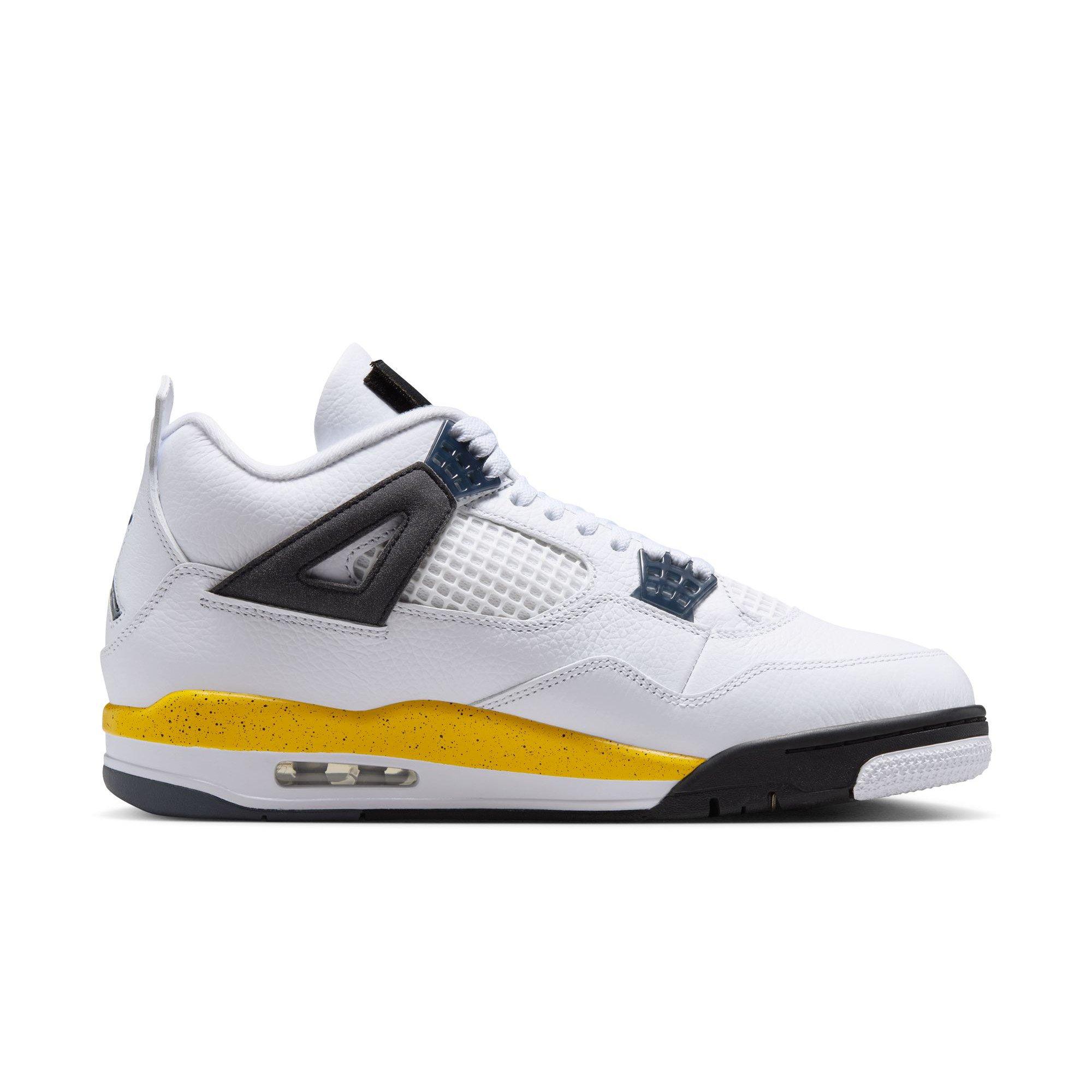 Side view of the Air Jordan 4 Tour Yellow sneaker with a white leather upper, white mesh panels, dark gray wings and a yellow speckled midsole above visible Air cushioning.