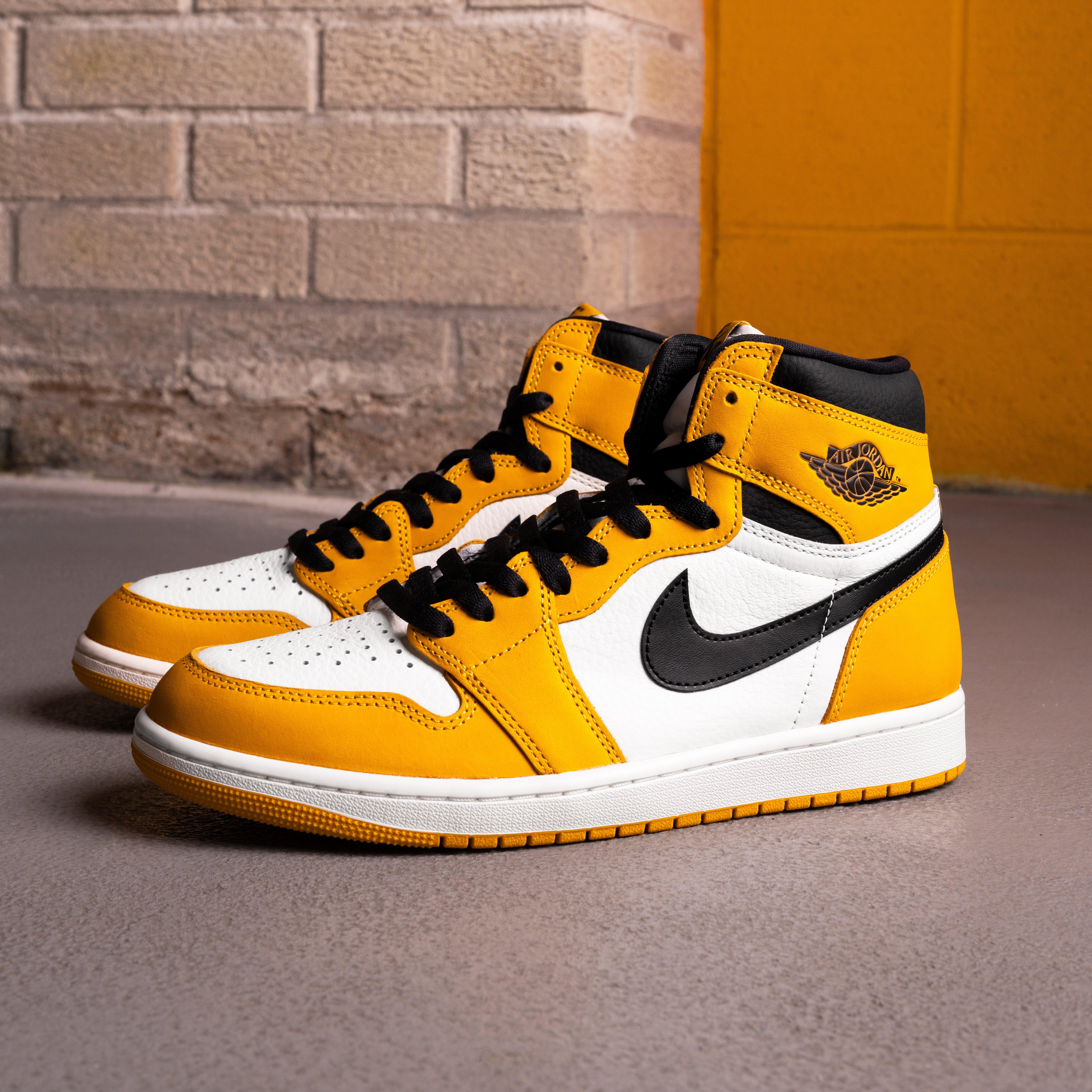 Air Jordan 1 High OG "Yellow Ochre" Left Shoe Side With Right Shoe