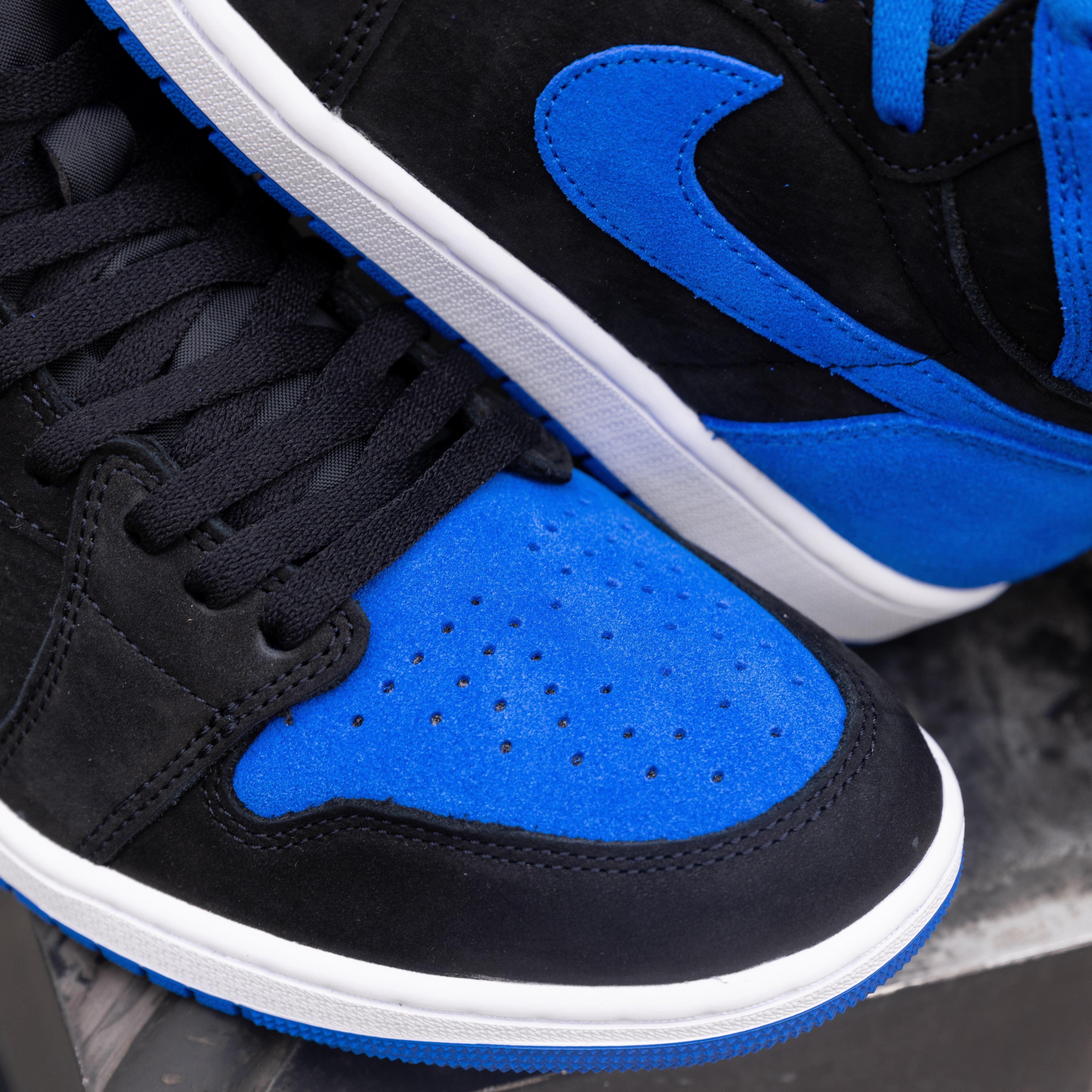 aj1-retro-high-og-royal-reimagined-toe-box-and-swoosh-close-up