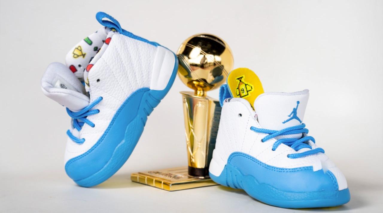 Turquoise and best sale white jordan 12