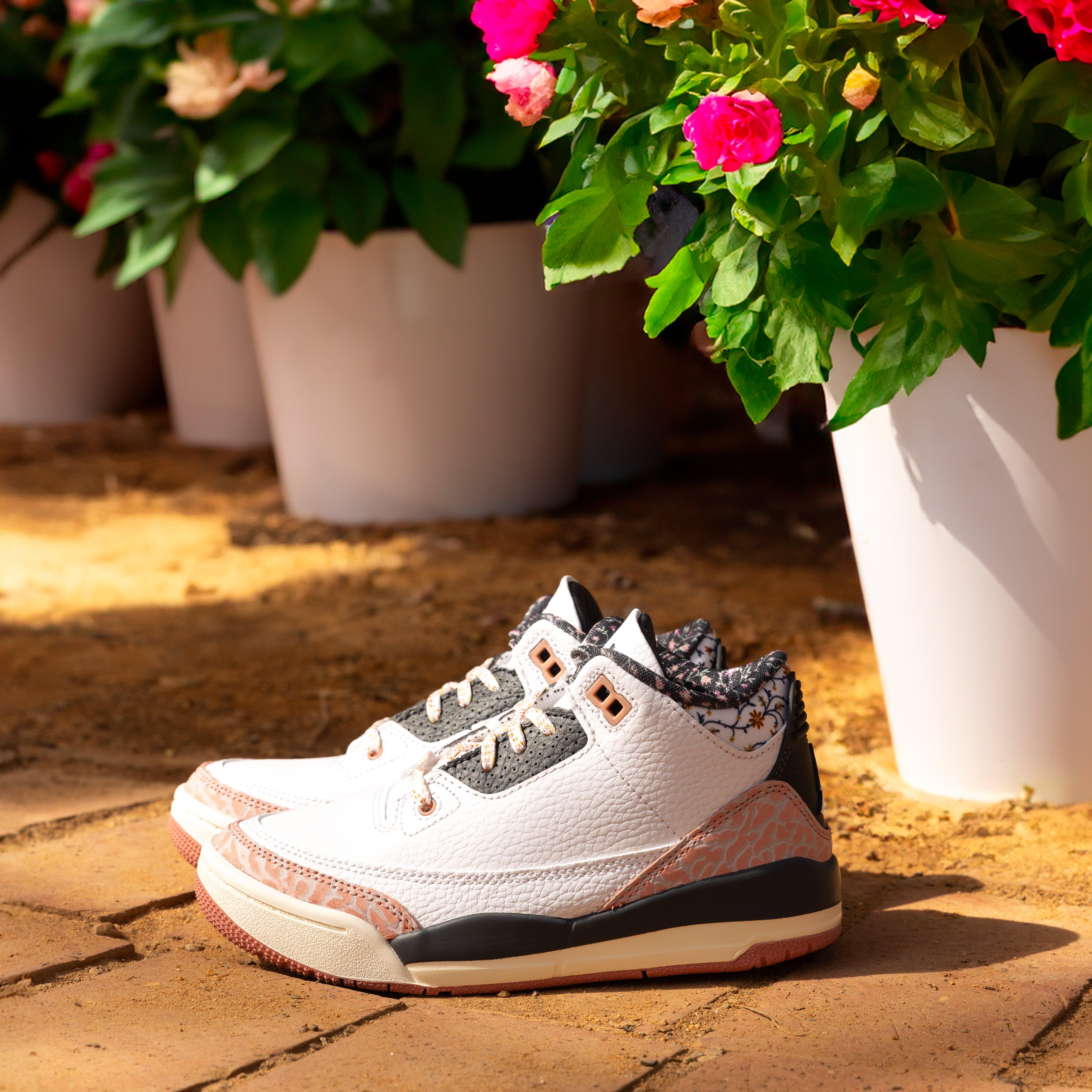 Kids’ Air Jordan 3 Retro “Vintage Floral” - Left Shoe Near Flower Pot