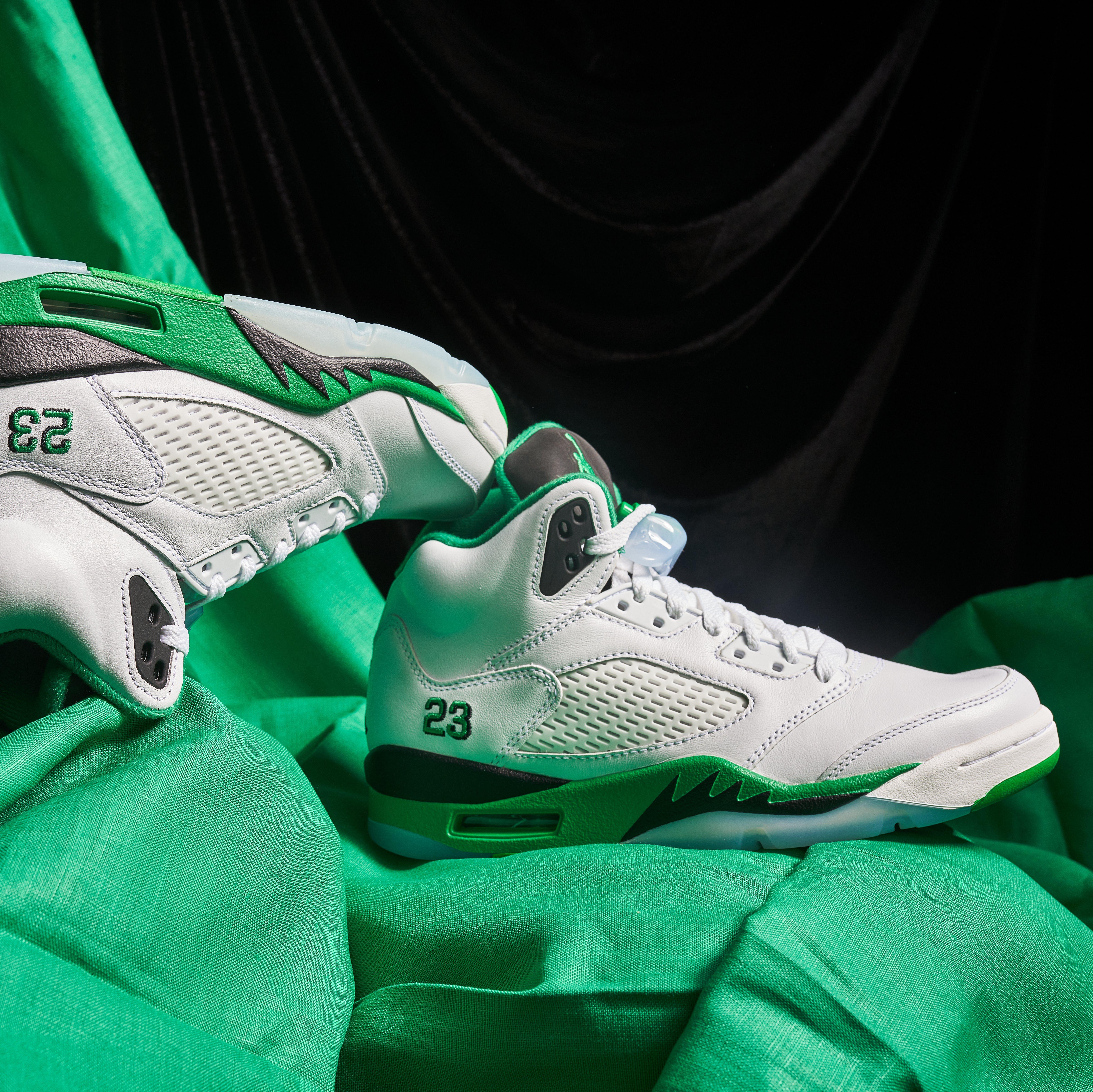 Women's Air Jordan 5 Retro “Lucky Green” Left Shoe Upside Down and Right Shoe Side