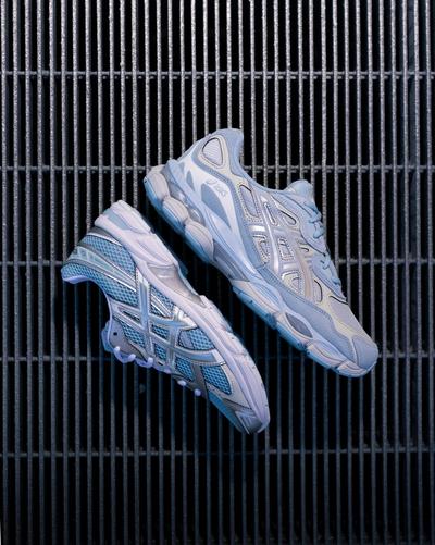 Blue and silver Asics sneakers