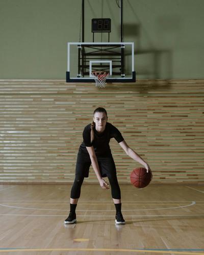 Girl dribbling a basketball