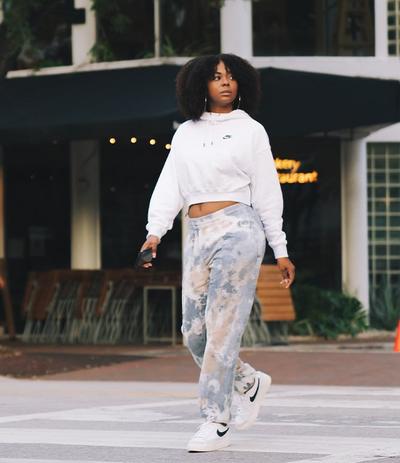 Bianca wearing Nike sweatpants and joggers
