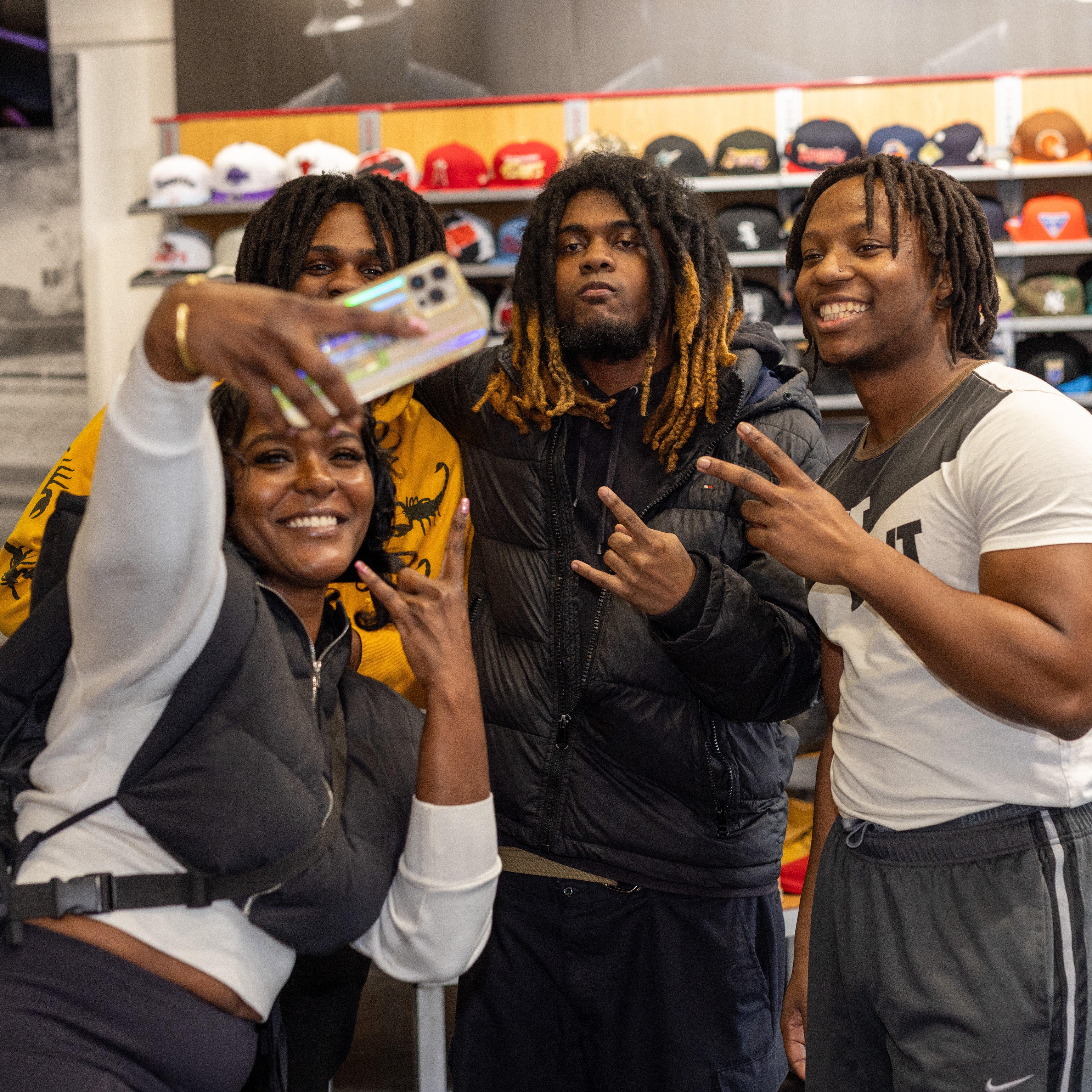  brince-etter-posing-with-fans-at-fotb-event