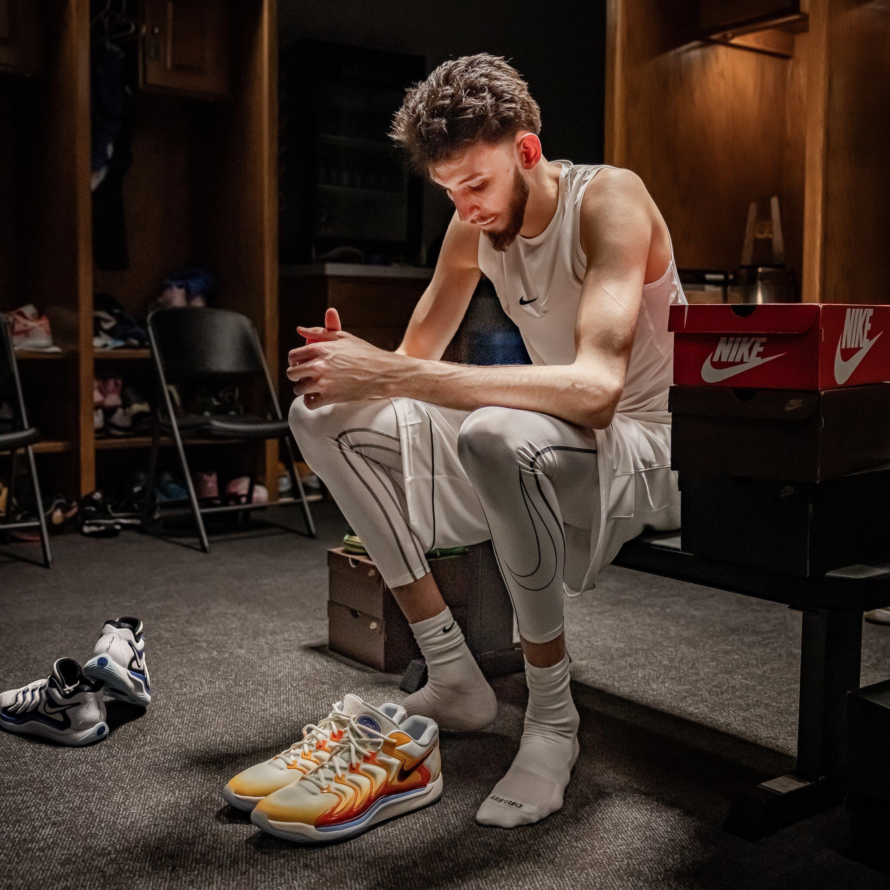 chet-holmgren-locker-room-with-shoes-off