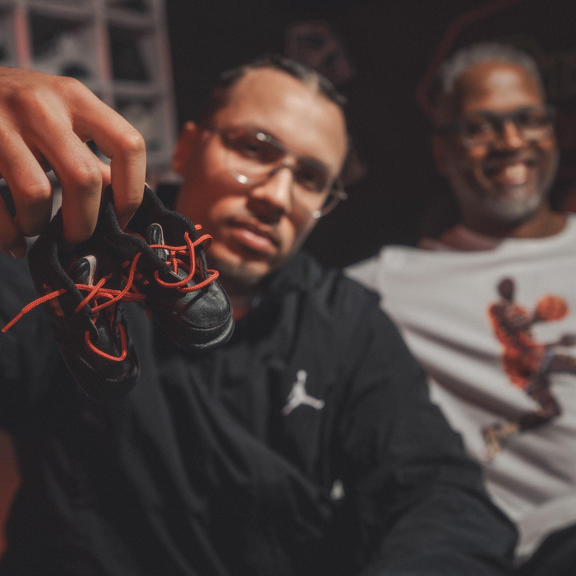 cleared-for-takeoff-featuring-dj-sneakehead-holding-baby-jordans