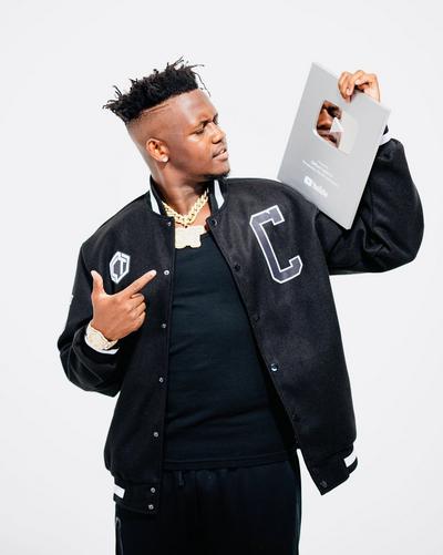 Clifford Taylor with his YouTube plaque