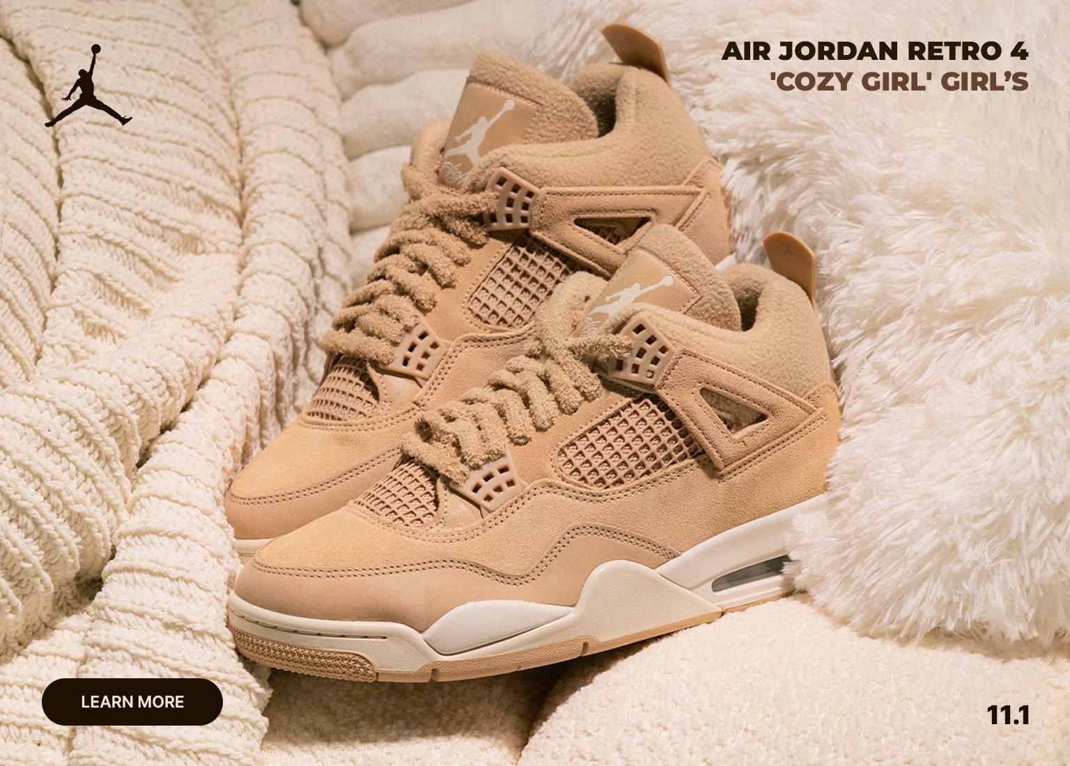 Kids' Air Jordan 4 Retro 'Cozy Girl' sneakers in tan on a textured white and beige blanket, with a close-up detail shot.