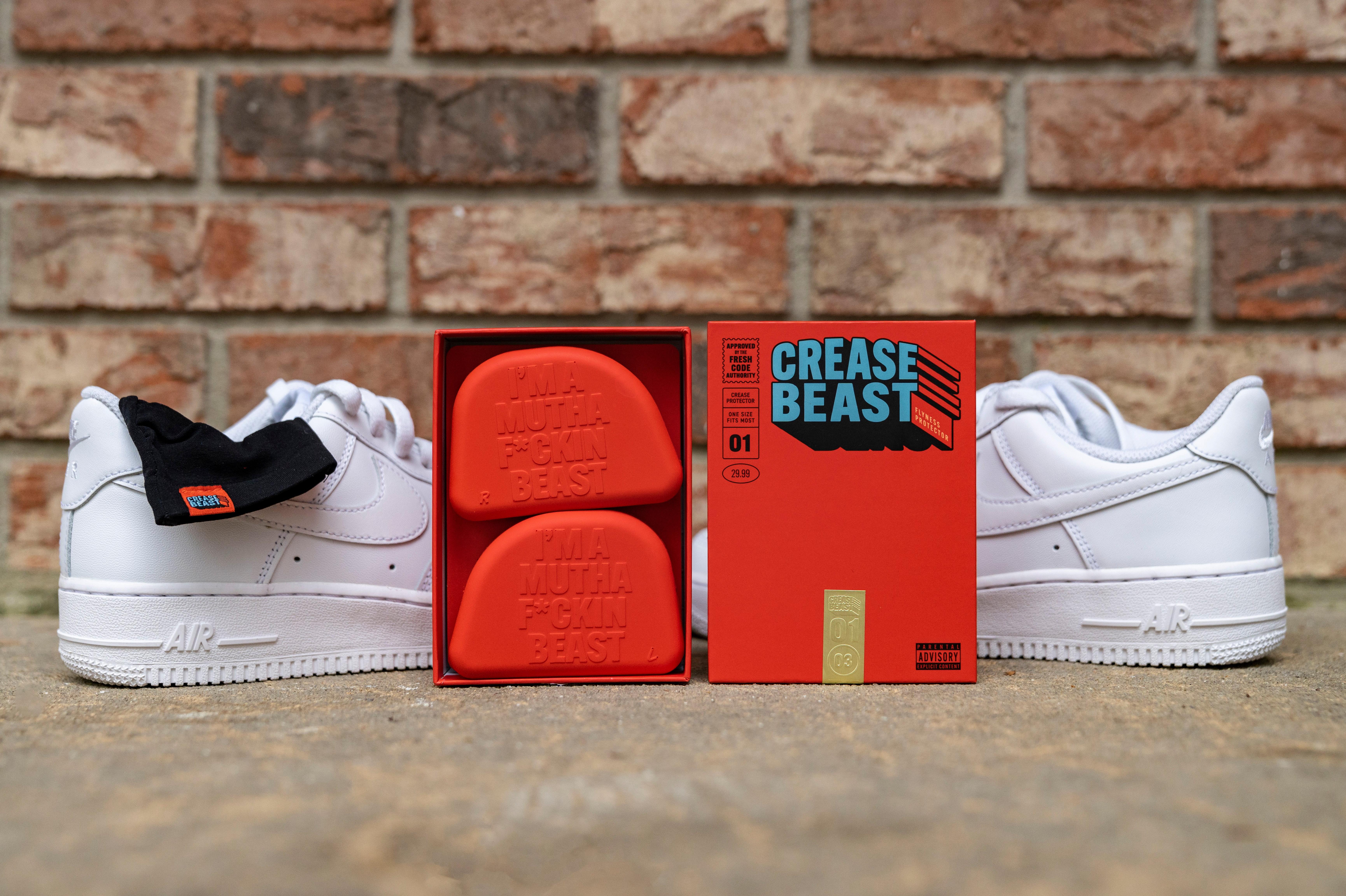 Crease Beast Box sitting in front of 2 white Air Force One sneakers