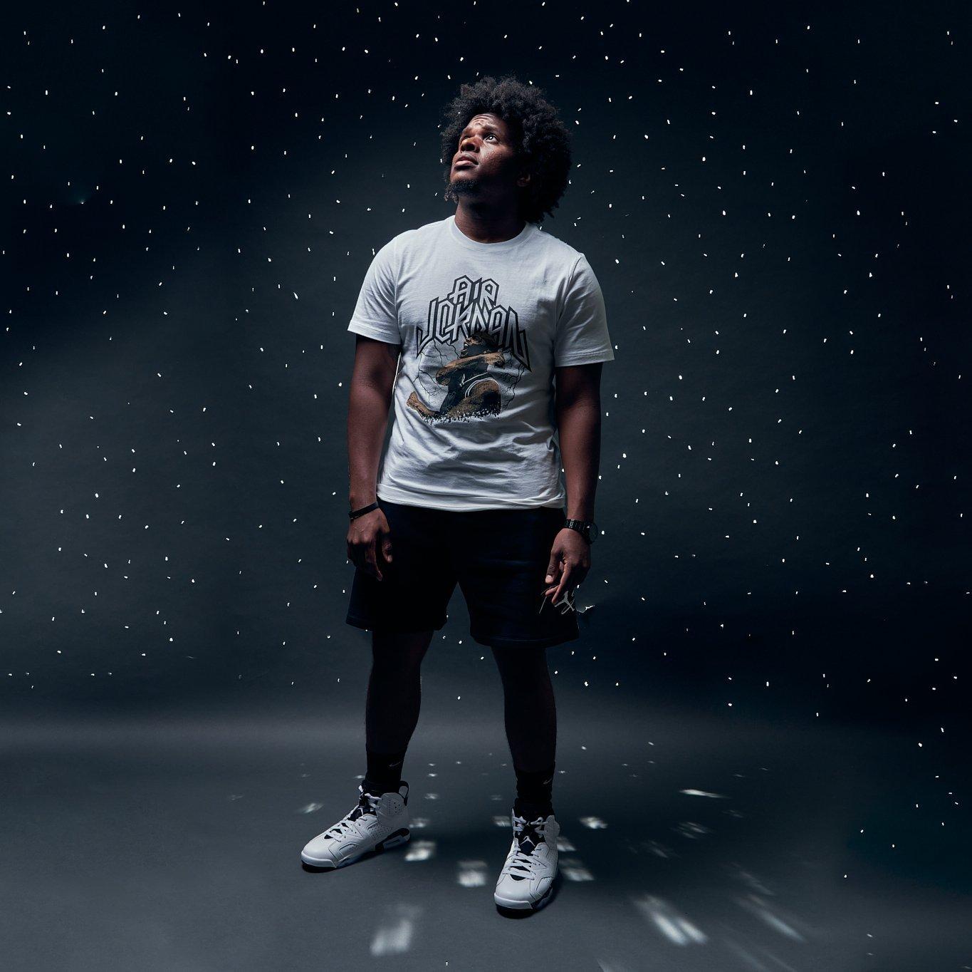 Air Jordan 6 Retro "Reverse Oreo" - Model Posing in Shoe