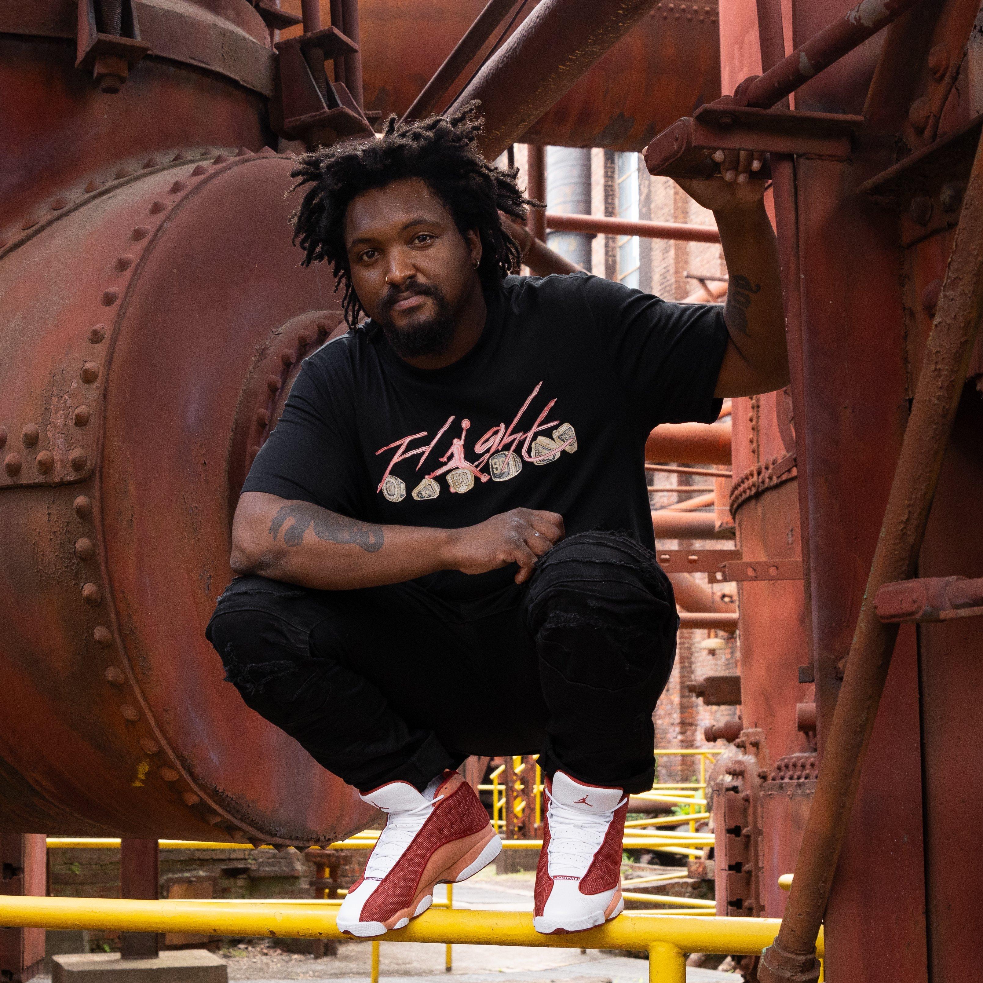Air Jordan 13 Retro "Dune Red" Model Posing at Sloss Furnace 
