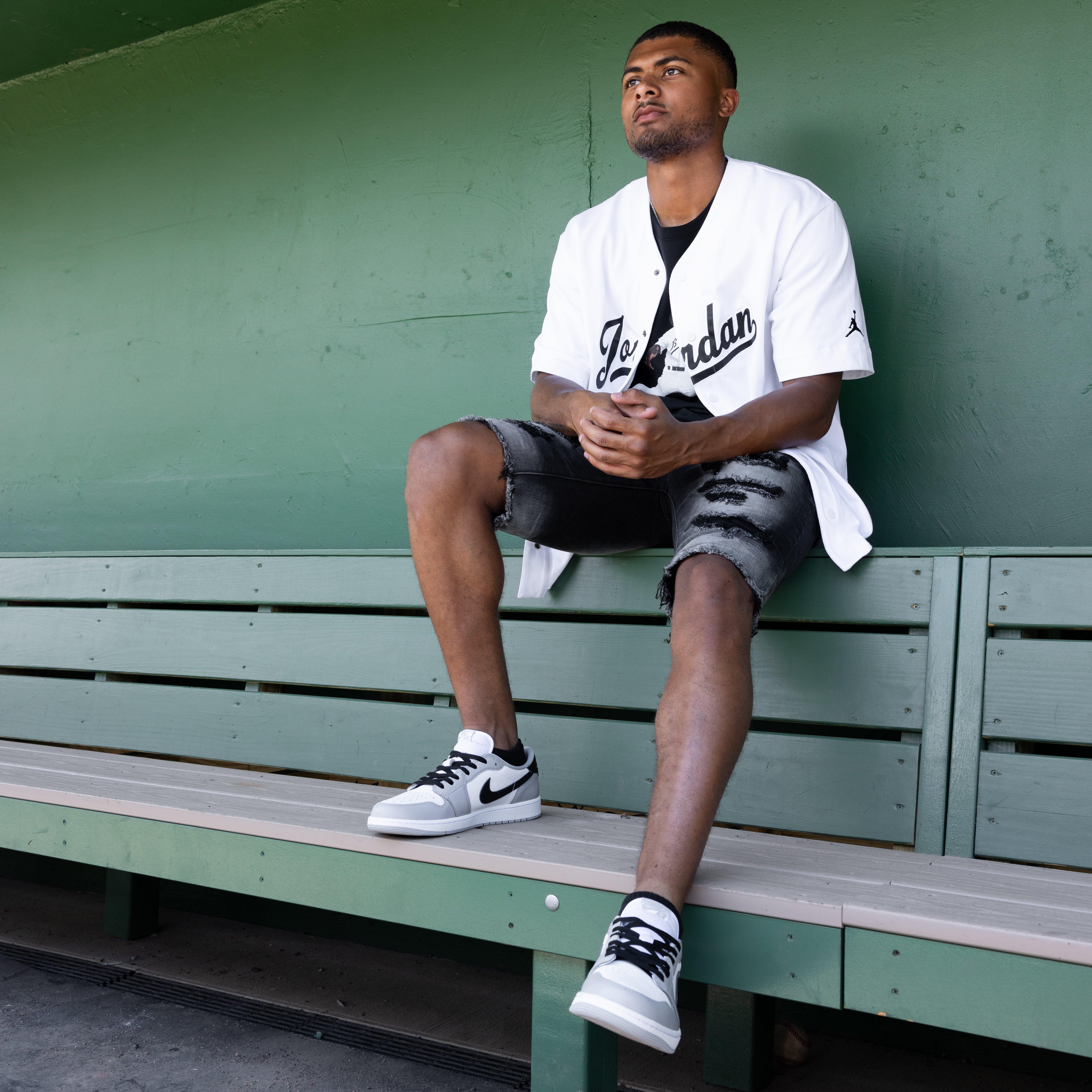 Jordan 1 Low OG "Wolf Grey" - Model on Bleachers