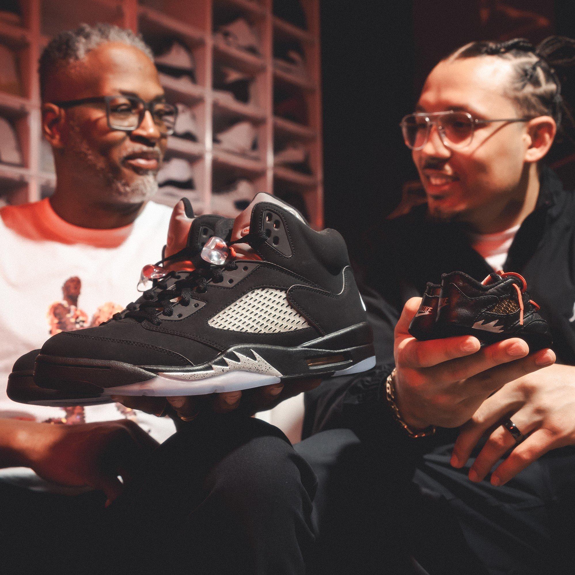 dj-sneakerhead-and-dad-holding-father-son-jordan-sneakers