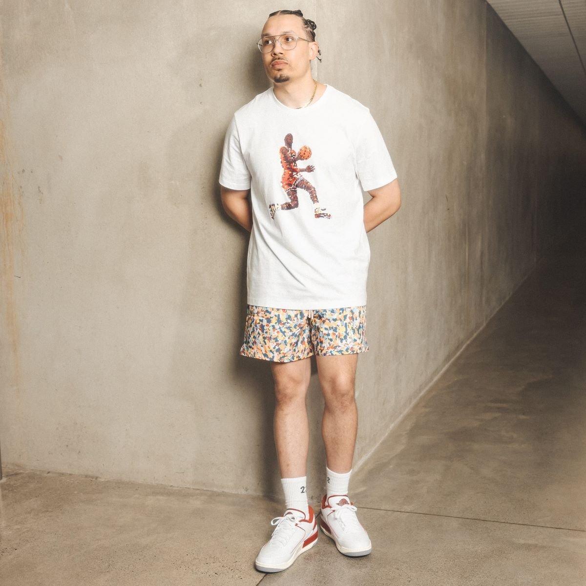 DJ Sneakerhead Posing on Wall in Jordan 2/3s